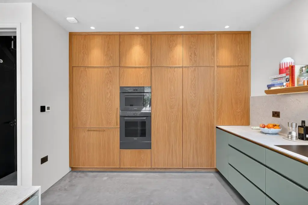 Award-winning modern minimalist kitchen design with bespoke oak cabinetry