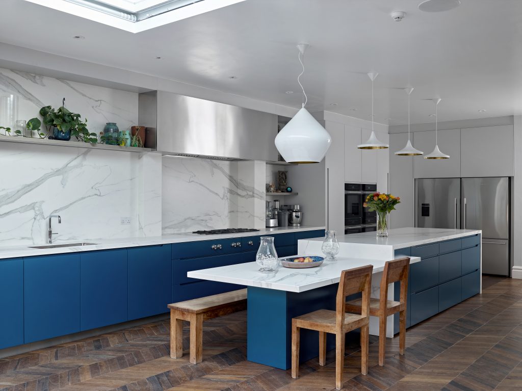 Handleless lifestyle kitchen design with integrated appliances