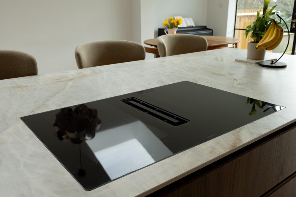 Siemens induction venting hob integrated into a bespoke porcelain kitchen island